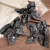 Grey, grey-toned bow, square large intestine hair band, women's hair tie, high-end look, ponytail, bun hair tie, hair accessory Application Scenario